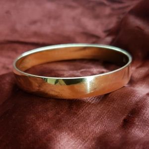 Kate Spade High Polish Gold-tone bangle, "As Good As Gold "